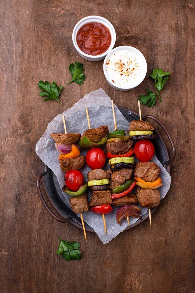 Grilled Kebabs With Meat, Mushrooms And Vegetables